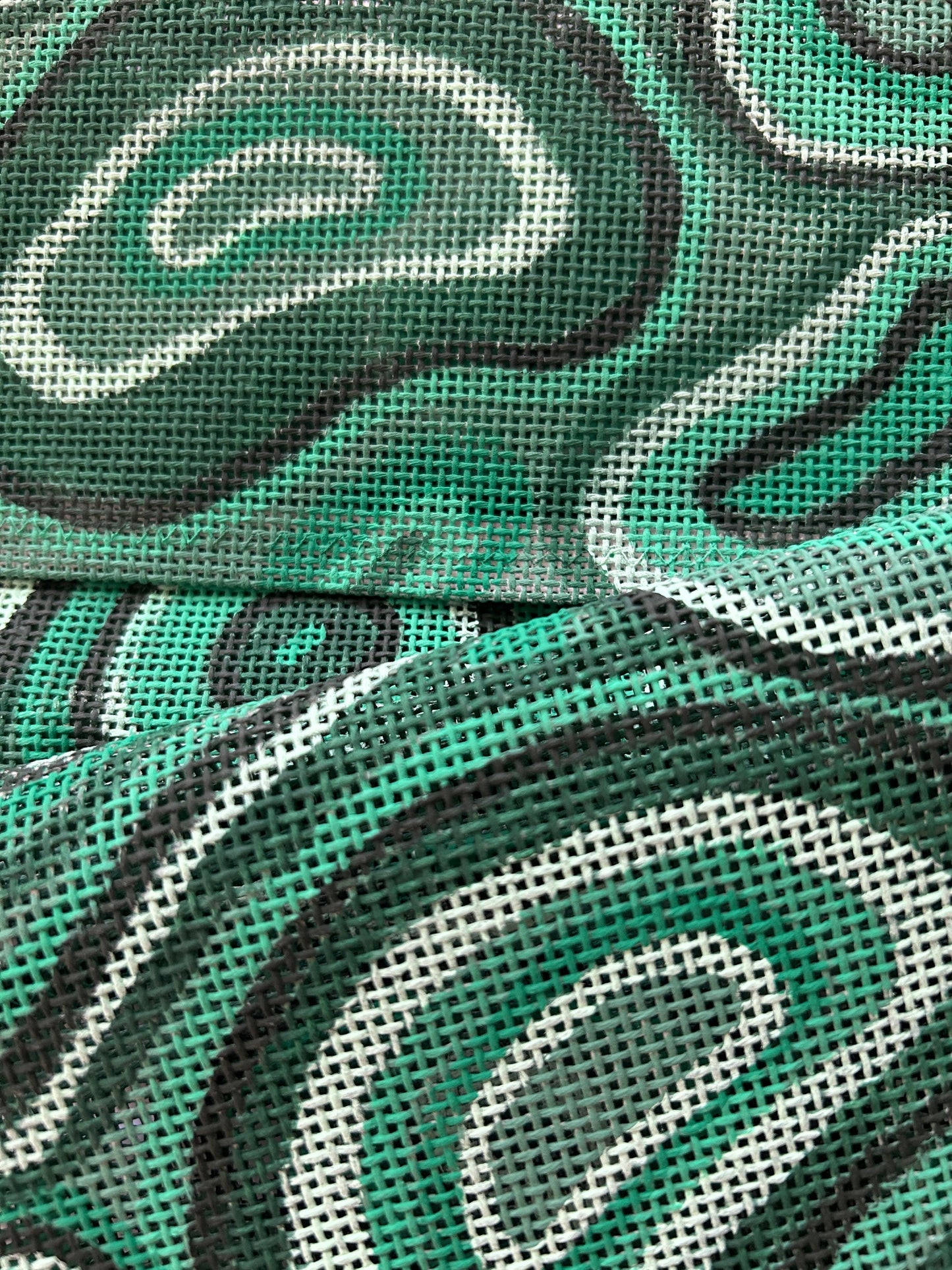 Comparison image of malachite pattern in different weights of needlepoint canvas