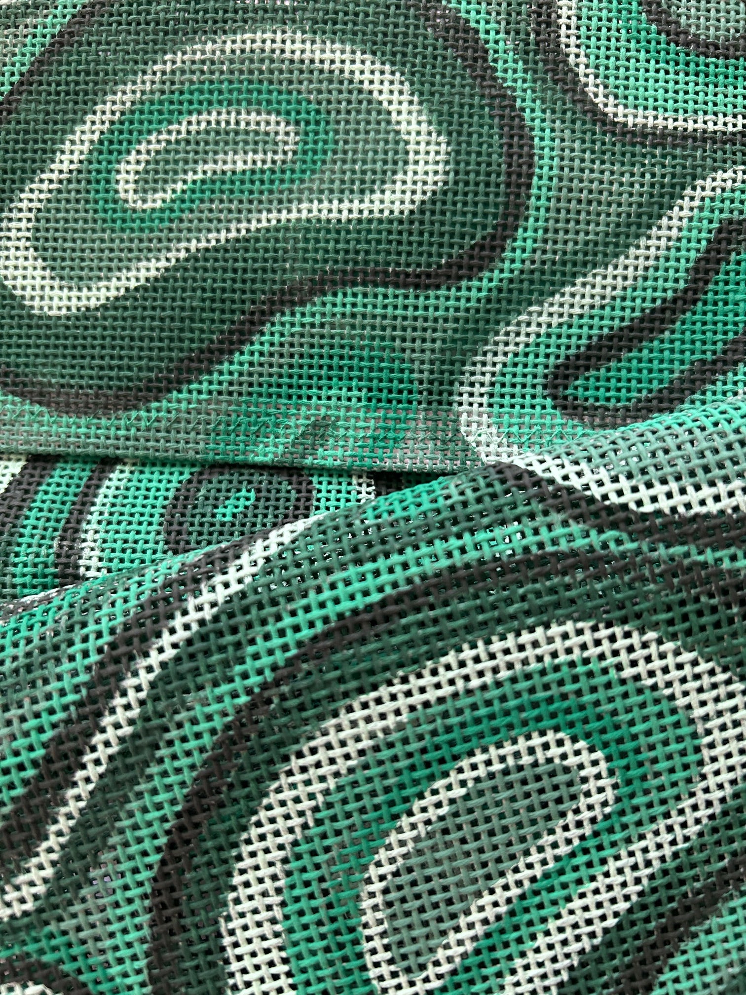 Comparison image of malachite pattern in different weights of needlepoint canvas