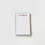 Notepad with 'ADD TO STASH' text on a white background