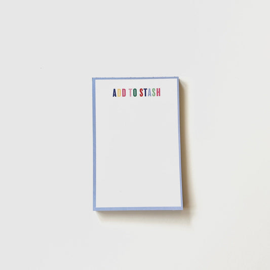 Notepad with 'ADD TO STASH' text on a white background