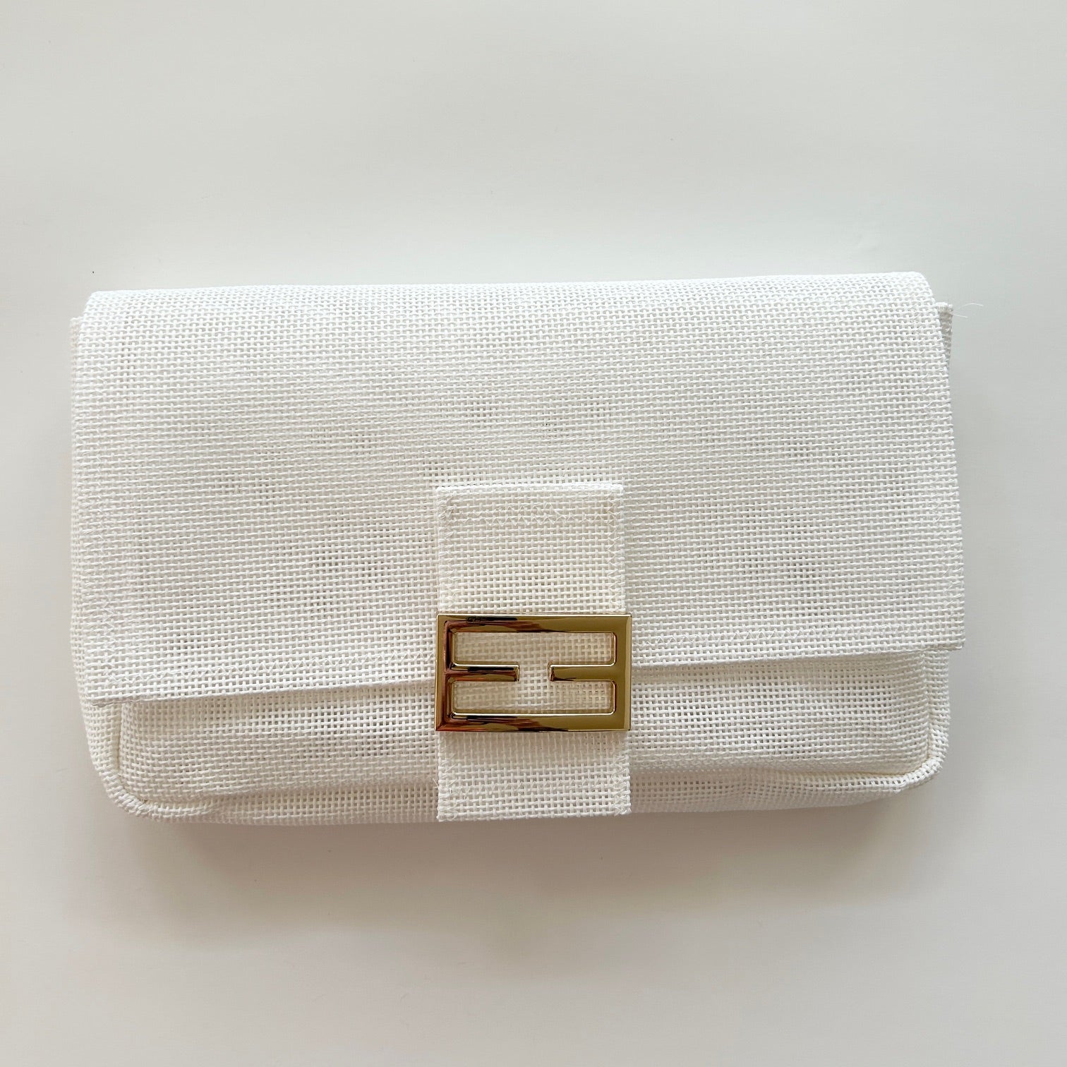 White needlepoint 13 mesh bag.