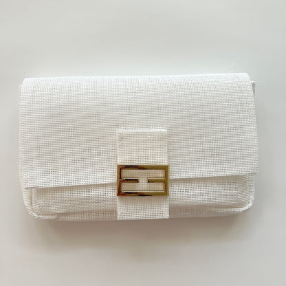 White needlepoint 13 mesh bag.