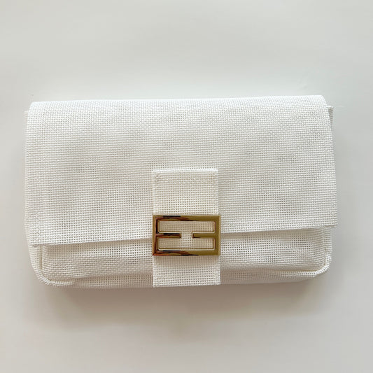 White needlepoint 13 mesh bag.
