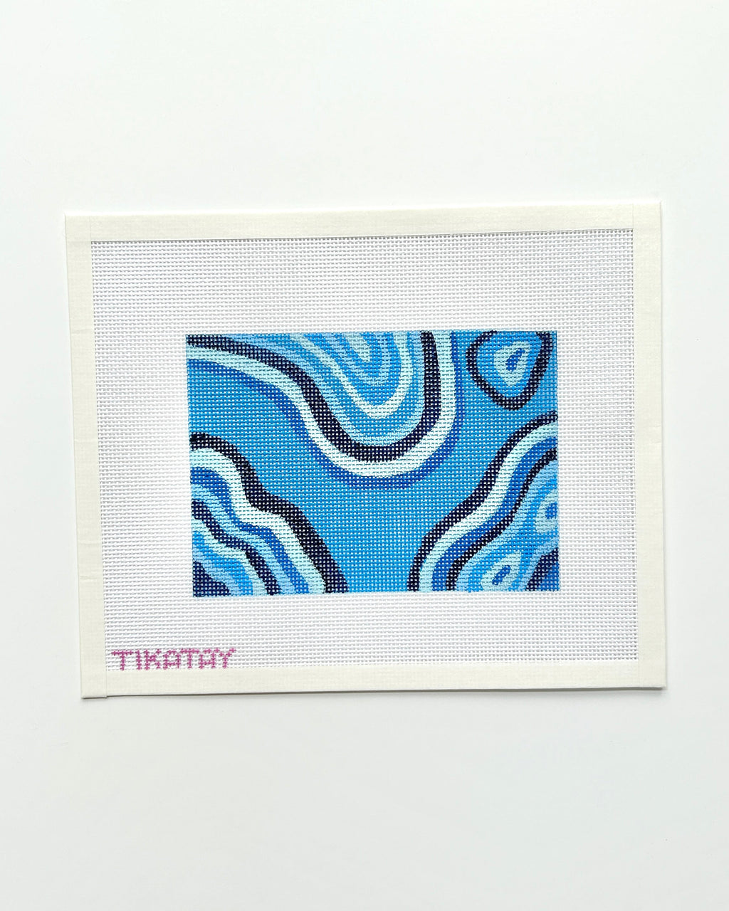 blue malachite needlepoint canvas on white background