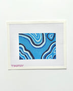 blue malachite needlepoint canvas on white background