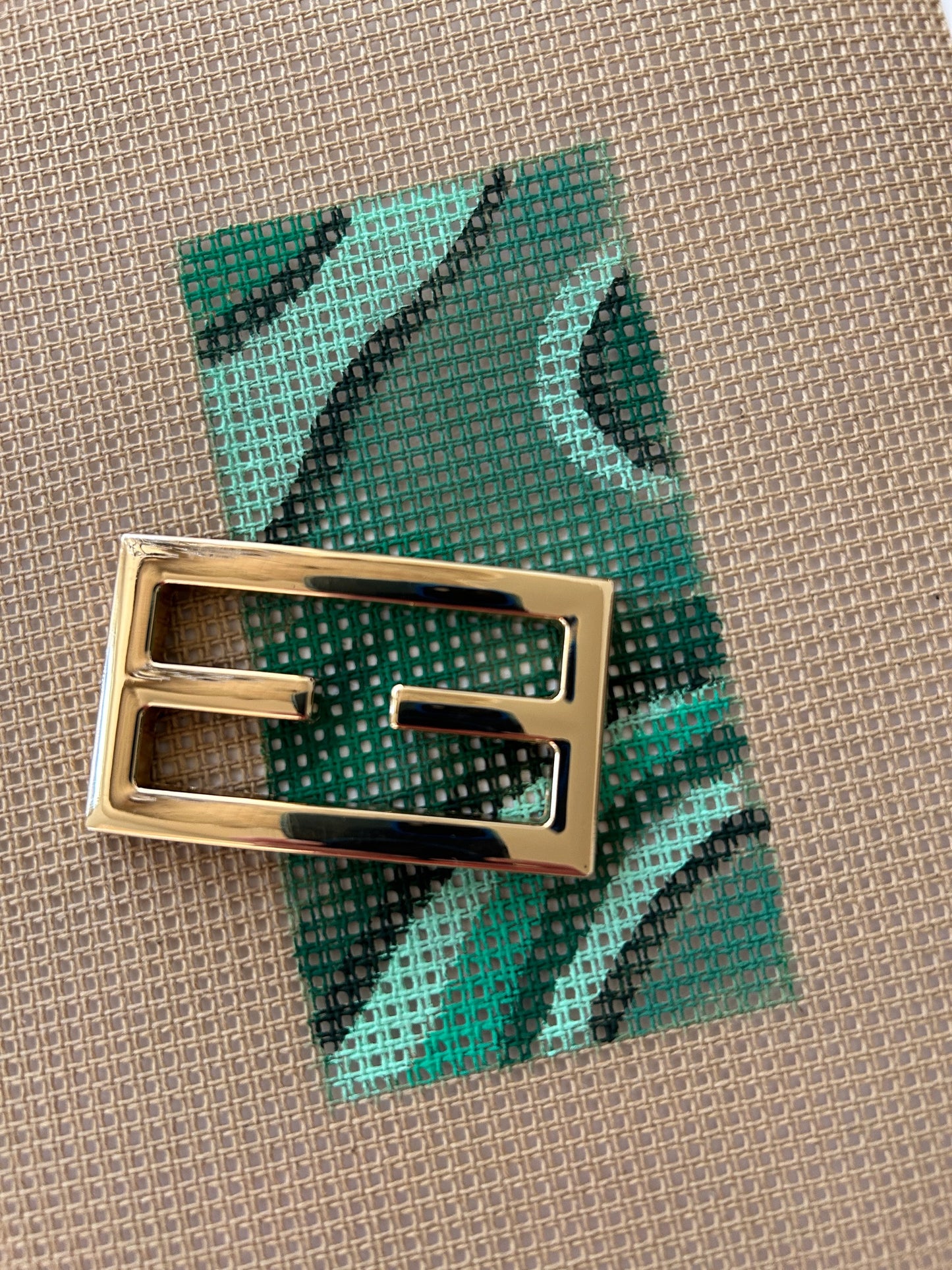 Malachite  pattern on needlepoint canvas with gold hardware