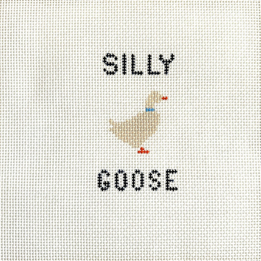Silly goose canvas with the words silly goose and a needlepoint design of a cream colored goose with a blue ribbon.